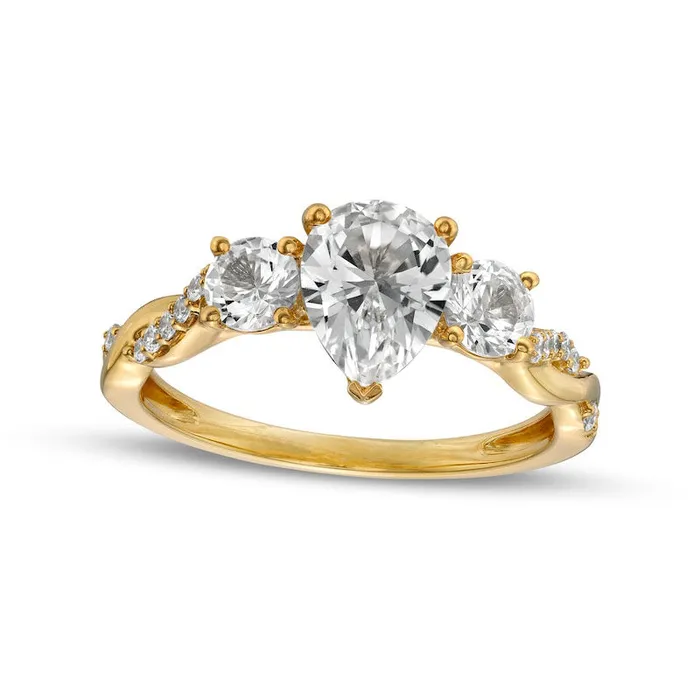 PearShaped White LabCreated Sapphire and 010 CT TW Diamond Antique VintageStyle Ring in Solid 10K Yellow Gold Goldia Rings PearShaped White LabCreated Sapphire and 010 CT TW Diamond Antique VintageStyle Ring in Solid 10K Yellow Gold Goldia Rings